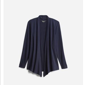 Soft and drapes so nicely. Very flattering. Navy blue.